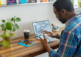 black man working on laptop.jpg